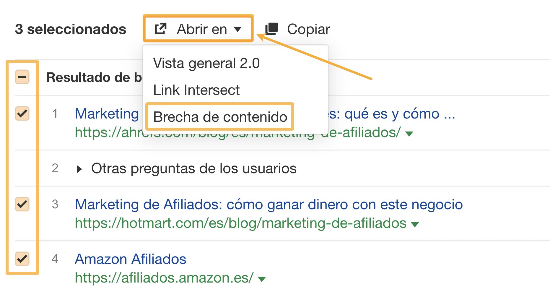 Acceso al informe Brecha de contenido desde el Resumen de páginas de resultado ("SERP") en Keywords Explorer de Ahrefs.