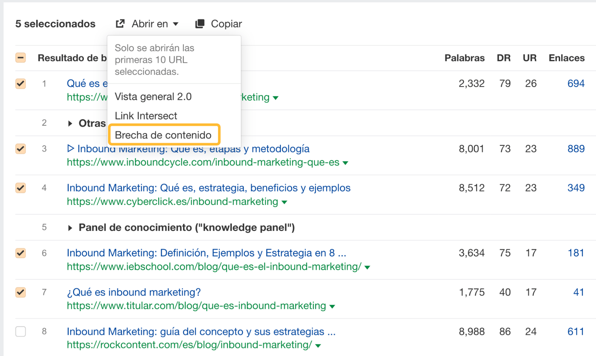 Uso de la función "Abrir en brecha de contenido" para ver los rankings de palabras clave comunes, a través del Keywords Explorer de Ahrefs.