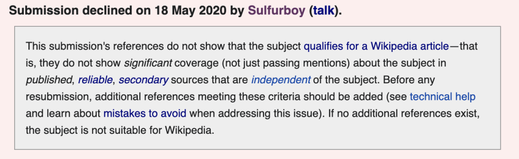 Wikipedia の審査結果を示すメッセージ画面のスクリーンショットで、提出した記事が「注目性が不十分」と判断され、掲載基準を満たしていないとして却下されたことを通知している様子。