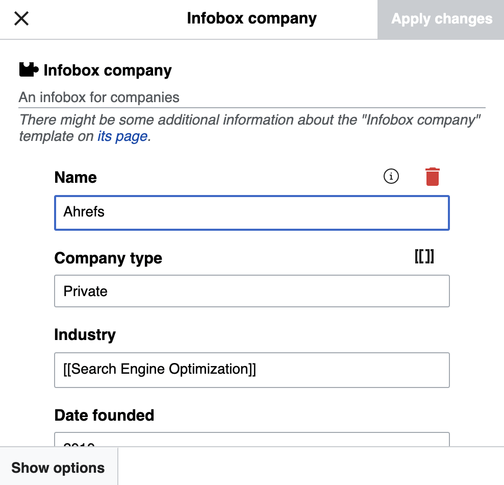 Wikipedia の編集画面のスクリーンショットで、メニューの「挿入」から「テンプレート」を選び、「Infobox company」を挿入する手順が示されている様子。