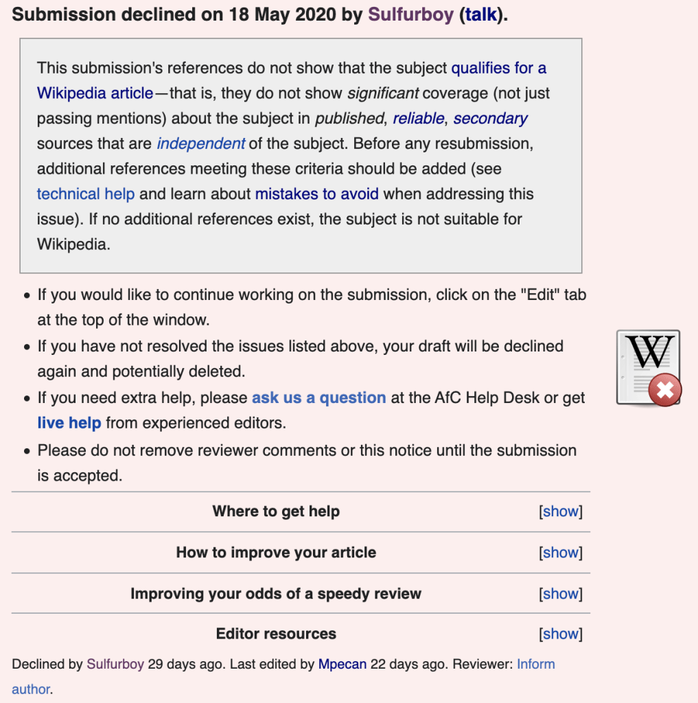 Wikipedia の通知画面。赤枠の警告ボックスに「下書きが審査で却下された」旨のメッセージが表示され、理由や改善ポイントが箇条書きで示されている。