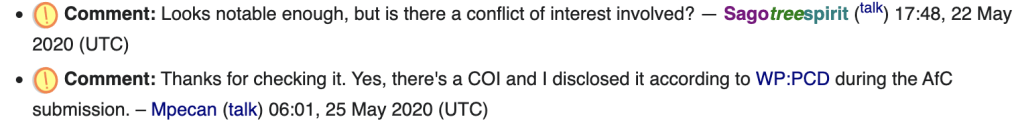 Wikipedia の通知バーにCOIについて追加の質問が届いたことを知らせる警告メッセージのスクリーンショット。