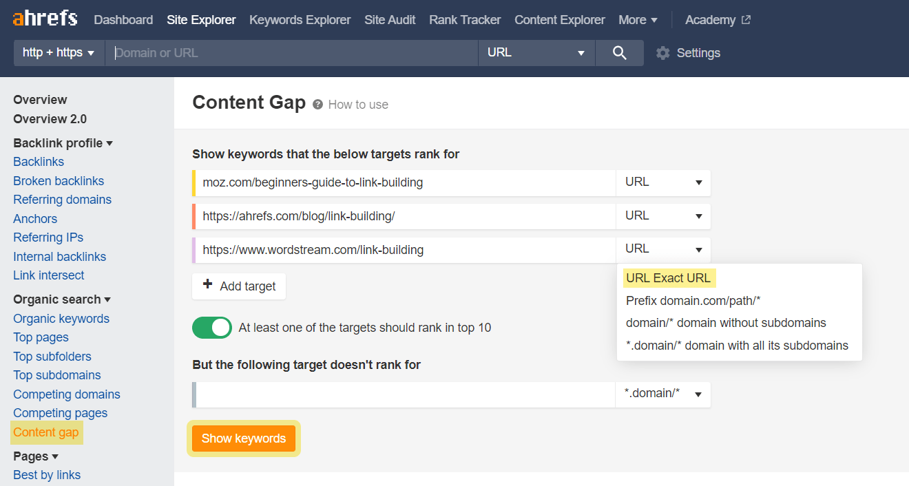 Ahrefs' Content Gap tool. Text fields for competitors' URLs. Below that is text field for your website's URL