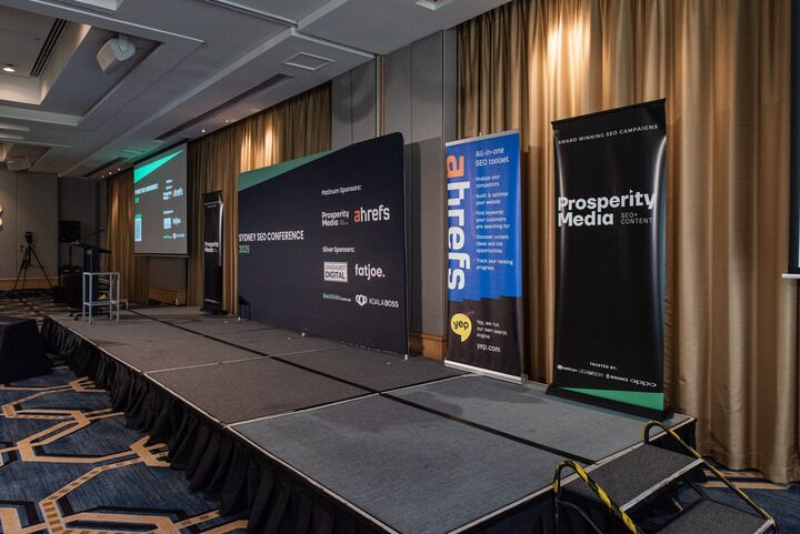 Our roll-up banner on stage at Sydney SEO 2025